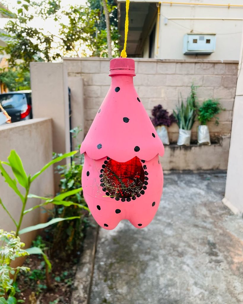 pink birdhouse from plastic bottle