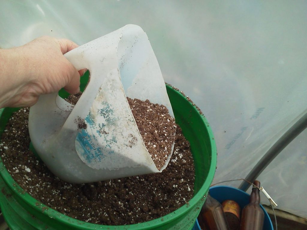 soil scoop from a plastic bottle