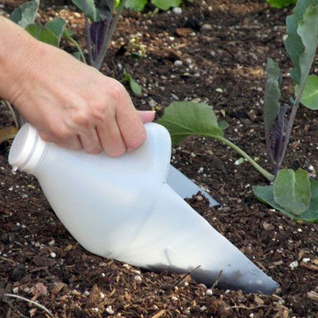 soil scoop from a plastic bottle