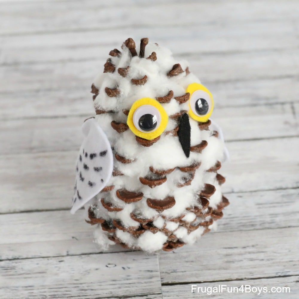 winter crafts for kids - pinecone snowy owl
